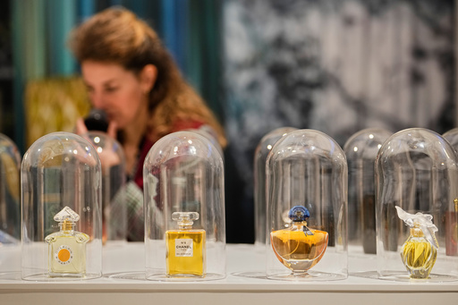 A woman smells samples of famous perfumes during the exhibition "The Secret Power of Scents", showing the history of scent from antiquity to the present as a sensory experience at the Kunstpalast art museum in Duesseldorf, Germany, Tuesday, Oct. 28, 2025. (AP Photo/Martin Meissner) A woman smells samples of famous perfumes during the exhibition "The Secret Power of Scents", showing the history of scent from antiquity to the present as a sensory experience at the Kunstpalast art museum in Duesseldorf, Germany, Tuesday, Oct. 28, 2025. (AP Photo/Martin Meissner)