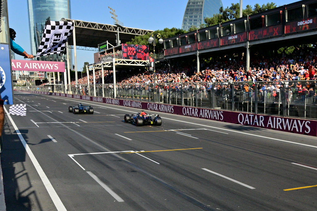 Mercedes driver George Russell of Britain crosses the finish line during the Azerbaijan F1 Grand Prix auto race, in Baku, Azerbaijan, Saturday, Sept. 26, 2026. (Andrej Isakovic/Pool via AP)