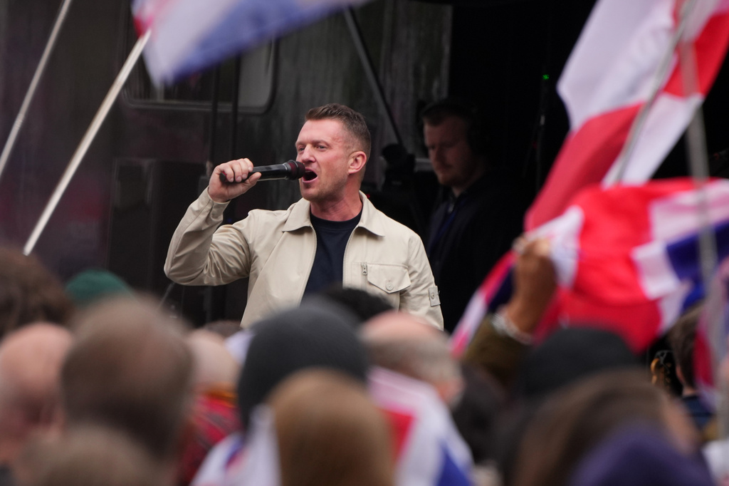Far-right agitator Stephen Yaxley-Lennon, known by his pseudonym Tommy Robinson speaks during an Unite the Kingdom rally in London, Saturday, May 16, 2026.(AP Photo/Kirsty Wigglesworth)