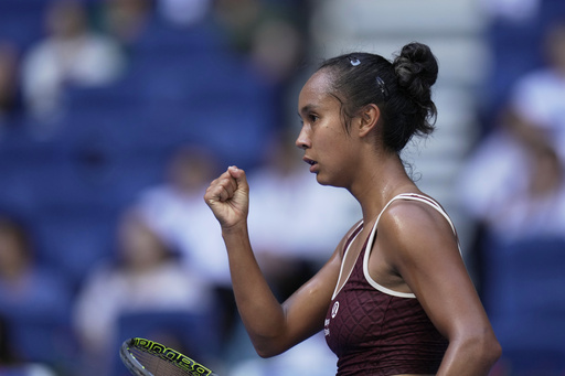 Leylah Fernandez of Canada reacts after scoring a point against Coco Gauff of the United States during a women's singles match of the China Open tennis tournament, at the National Tennis Center, in Beijing, China, Sunday, Sept. 28, 2025. (AP Photo/Mahesh Kumar A.) Leylah Fernandez of Canada reacts after scoring a point against Coco Gauff of the United States during a women's singles match of the China Open tennis tournament, at the National Tennis Center, in Beijing, China, Sunday, Sept. 28, 2025. (AP Photo/Mahesh Kumar A.)
