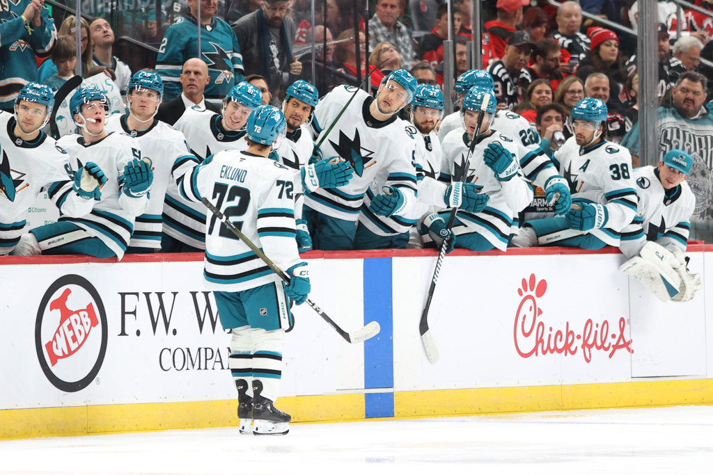 San Jose Sharks' William Eklund (72) reacts with teammates after scoring against the New Jersey Devils during the first period of an NHL hockey game Friday, Oct. 24, 2025, in Newark, N.J. (AP Photo/Pamela Smith)