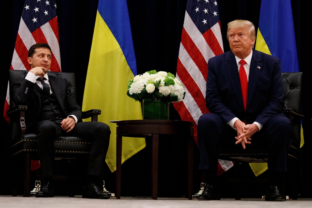 FILE - In this file photo taken Sept. 25, 2019, U.S. President Donald Trump meets with Ukrainian President Volodymyr Zelenskiy at the InterContinental Barclay New York hotel during the United Nations General Assembly, in New York. (AP Photo/Evan Vucci, File)