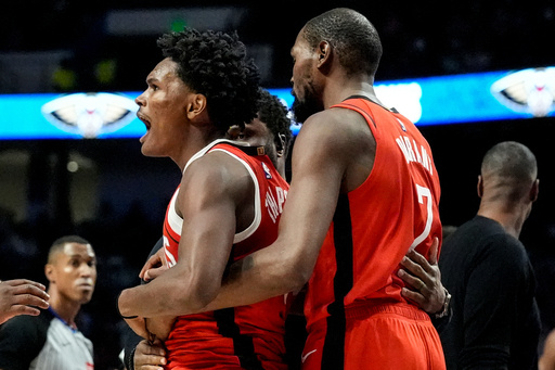 Houston Rockets' Amen Thompson (1) is held by Kevin Durant (7) after a scuffle on the court against New Orleans Pelicans' Jose Alvarado during the first half of an NBA preseason basketball game, Tuesday, Oct. 14, 2025, in Birmingham, Ala. (AP Photo/Mike Stewart) Houston Rockets' Amen Thompson (1) is held by Kevin Durant (7) after a scuffle on the court against New Orleans Pelicans' Jose Alvarado during the first half of an NBA preseason basketball game, Tuesday, Oct. 14, 2025, in Birmingham, Ala. (AP Photo/Mike Stewart)