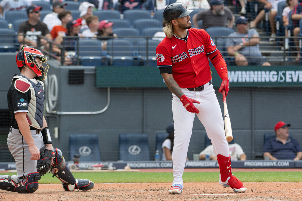 Cleveland Guardians' Gabriel Arias, right, watches his three-run home run off Chicago White Sox relief pitcher Erick Fedde as White Sox catcher Kyle Teel, left, looks on during the fifth inning of a baseball game, Sunday, July 5, 2026, in Cleveland. (AP Photo/Phil Long)