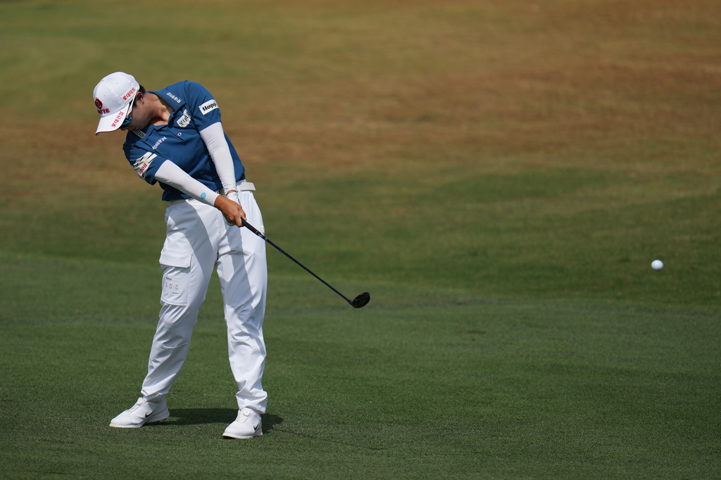Hyo Joo Kim, of South Korea, hits a fairway shot on the second hole during the final round of the LPGA Ford Championship golf tournament, Sunday, March 29, 2026, in Chandler, Ariz. (AP Photo/Ross D. Franklin)