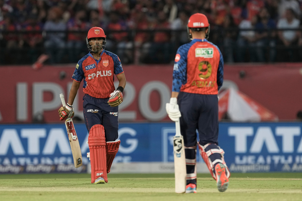 Punjab Kings' Shashank Singh, left, and Azmatullah Omarzai during the Indian Premier League cricket match between Punjab Kings and Royal Challengers Bengaluru in Dharamshala, India, Sunday, May 17, 2026. (AP Photo/Ashwini Bhatia)
