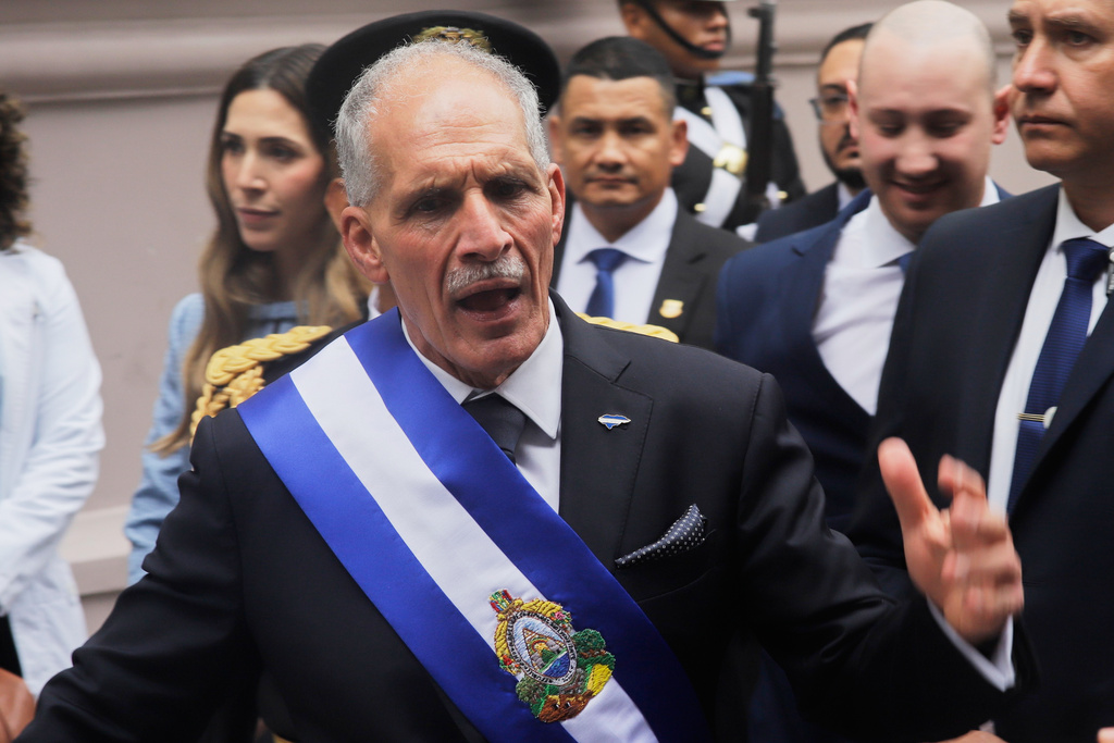 FILE - Honduran President Nasry Asfura speaks wearing the presidential sash after his inauguration ceremony at Congress in Tegucigalpa, Honduras, Jan. 27, 2026. (AP Photo/Fernando Destephen, File)