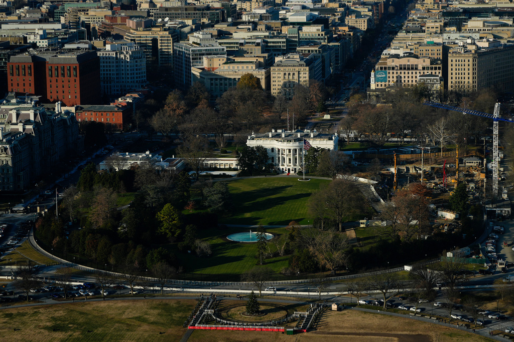 Work continues on the construction of the ballroom at the White House where the East Wing once stood, Tuesday, Dec. 16, 2025, in Washington. (AP Photo/Julia Demaree Nikhinson)
