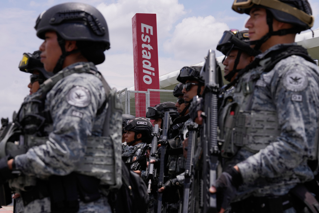 National Guard deploy outside the stadium that will host FIFA World Cup matches in Guadalajara, Mexico, Tuesday, June 9, 2026. (AP Photo/Matias Delacroix)