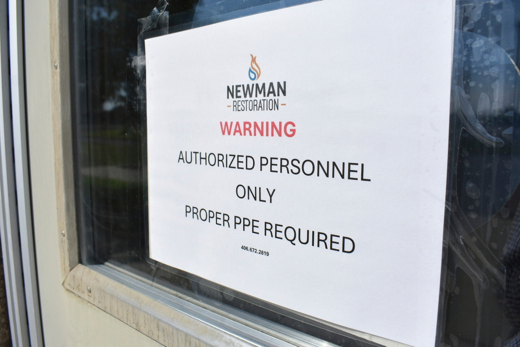 A sign is posted on the door of the Yellowstone Valley Animal Shelter on Friday, Sept. 12, 2025, in Billings, Mont. (AP Photo/Matthew Brown)