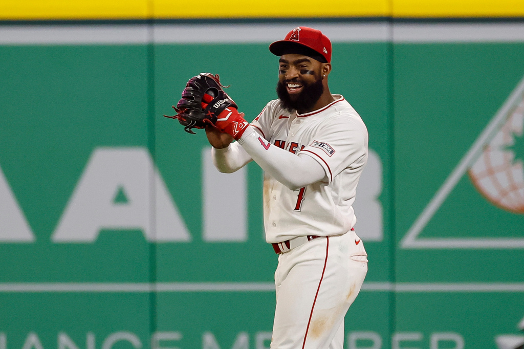 Los Angeles Angels left fielder Jo Adell (7) reacts after catching a ball hit by Seattle Mariners' J.P. Crawford during the ninth inning of a baseball game Saturday, April 4, 2026, in Anaheim, Calif. (AP Photo/Caroline Brehman)