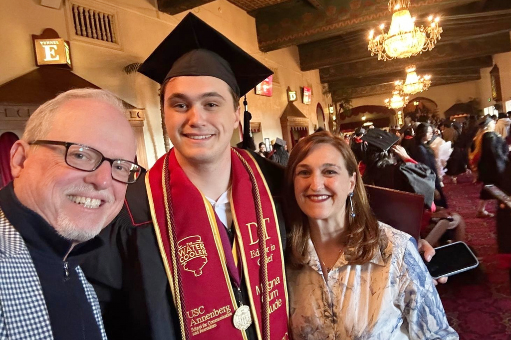 Associated Press sports writer Howard Fendrich, left, his son Stefano Fendrich and wife Rosanna Maietta pose for a selfie, May 15, 2025, in Los Angeles. (AP Photo/Howard Fendrich)