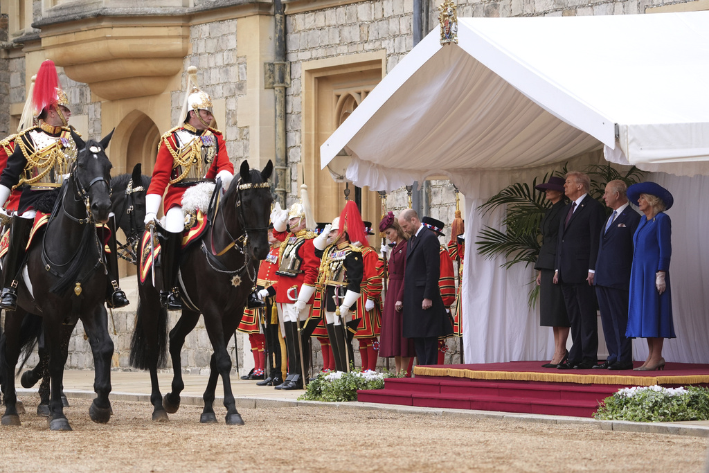 From left, Britain's Kate, Princess of Wales, Britain's Prince William, President Donald Trump and first lady Melania Trump, Britain's King Charles III and Britain's Queen Camilla during an arrival ceremony at Windsor Castle, in Windsor, England, Wednesday, Sept. 17, 2025. (AP Photo/Evan Vucci)