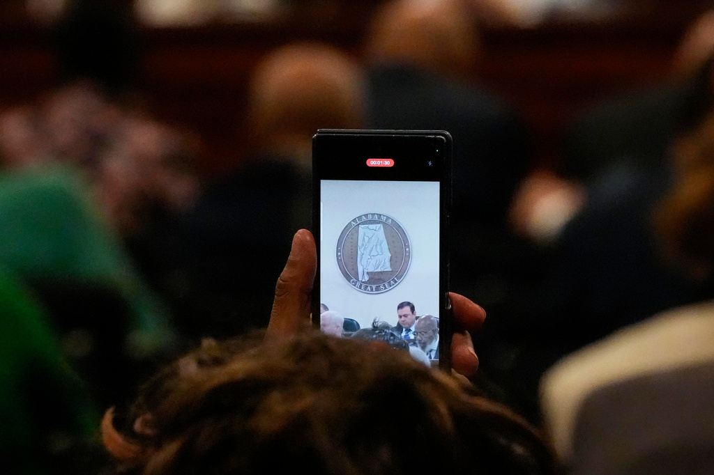A citizen records debate in committee meeting during a special session of the Alabama Legislature, Tuesday, May 5, 2026, in Montgomery, Ala. (AP Photo/Mike Stewart)