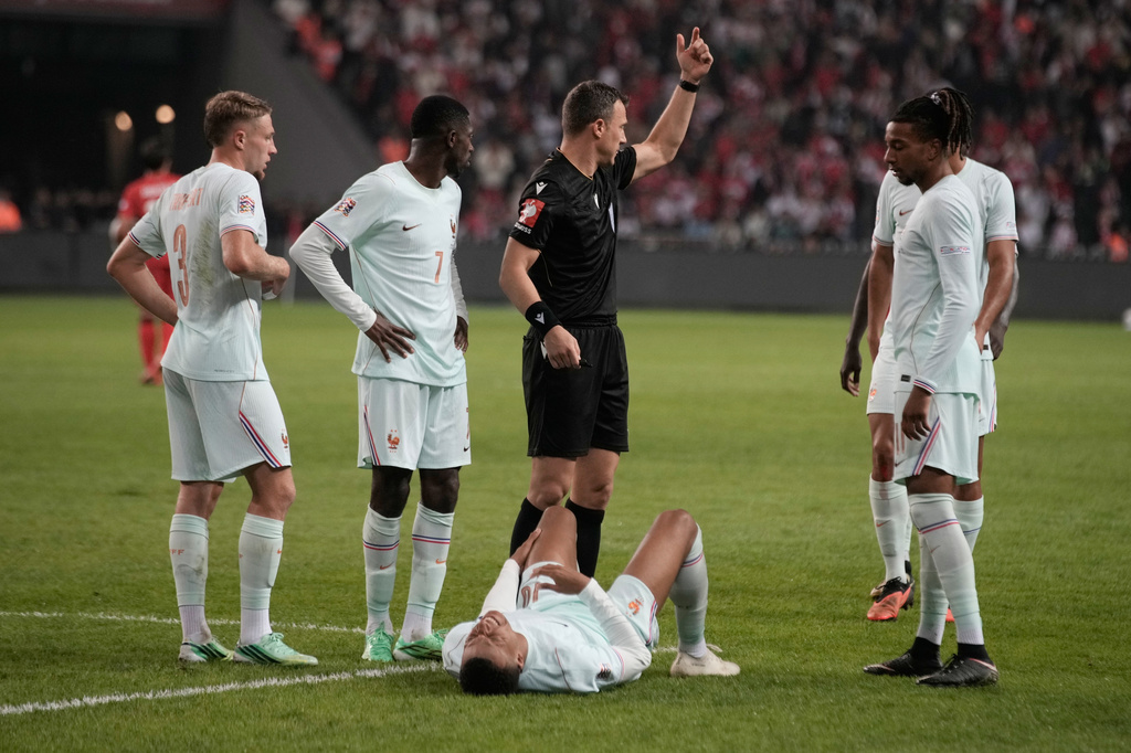 France's Kylian Mbappe lieas on the ground after he scored and injured himself during the UEFA Nations League soccer match between Turkey and France in Izmit, Turkey, Friday, Sept. 25, 2026. (AP Photo/Khalil Hamra)