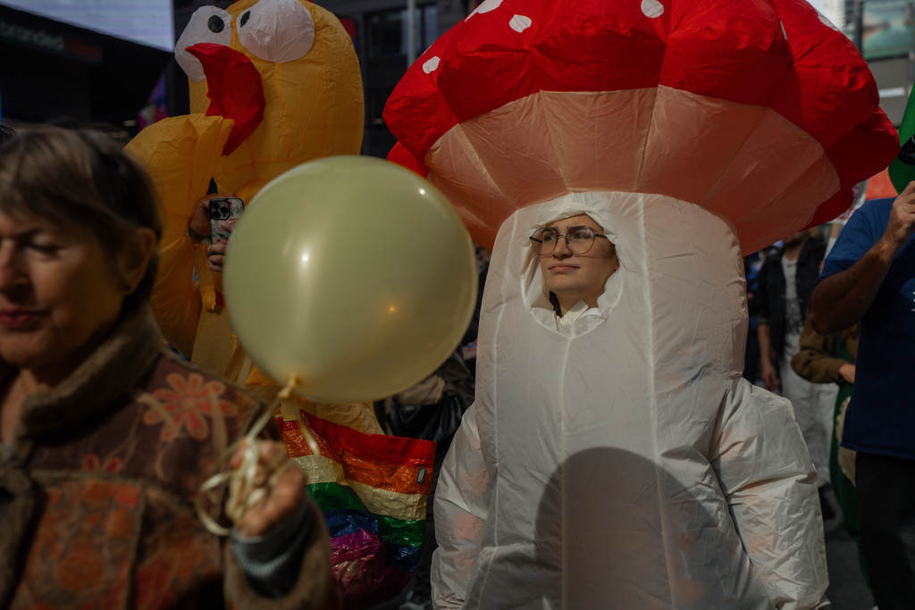 A protester wears a blow-up mushroom costume during a "No Kings" protest Saturday, Oct. 18, 2025, in New York. (AP Photo/Olga Fedorova)