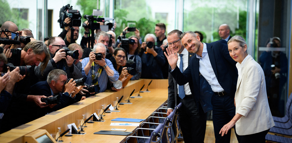 Co-leaders of Alternative for Germany party, or AfD, Alice Weidel, right, and Tino Chrupalla, left, and top candidate for the Saxony-Anhalt state elections Ulrich Siegmund, center, attend a press conference in Berlin, Germany, Monday, Sept. 7, 2026. (Bernd von Jutrczenka/dpa via AP)