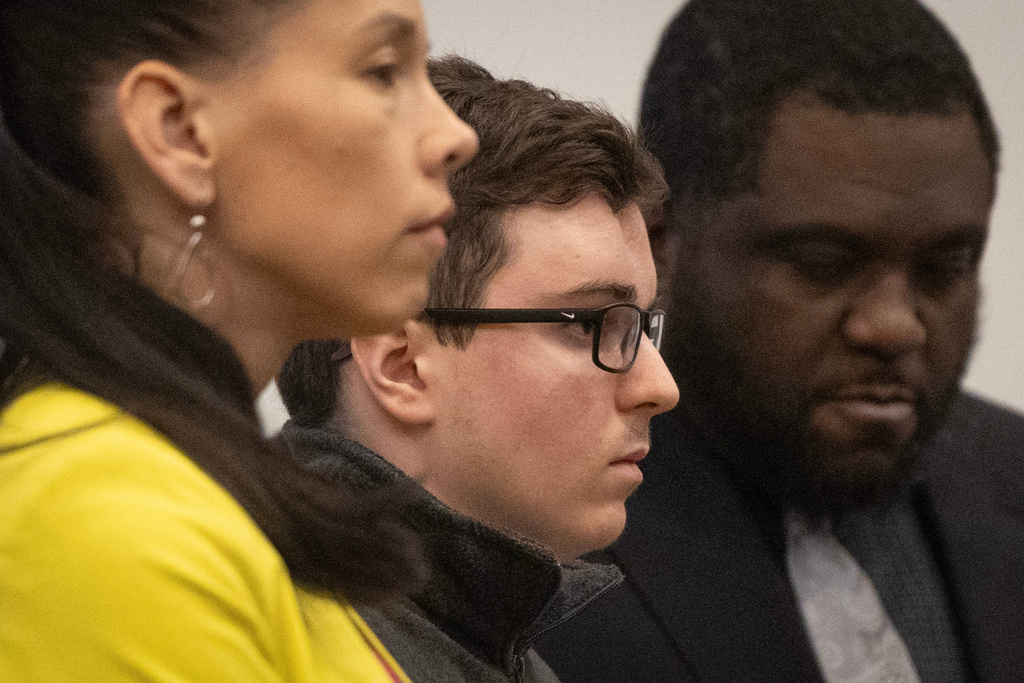 Austin Thompson, center, listens in court in Raleigh, N.C., on Friday, Feb. 13, 2026, as Wake County Superior Court Judge Paul C. Ridgeway sentences him to five life sentences without the possibility of parole. (Scott Sharpe/The News & Observer via AP, Pool)