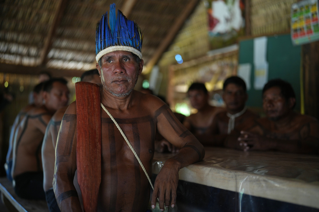 Chief Lazaro Xerente, 68, the eldest leader of the Xerente Indigenous people, attends a fire prevention operation along Brazil's environmental protection agency, IBAMA, at the Xerente territory, near Tocantinia, Tocantins state, Brazil, Tuesday, May 19, 2026. (AP Photo/Andre Penner)