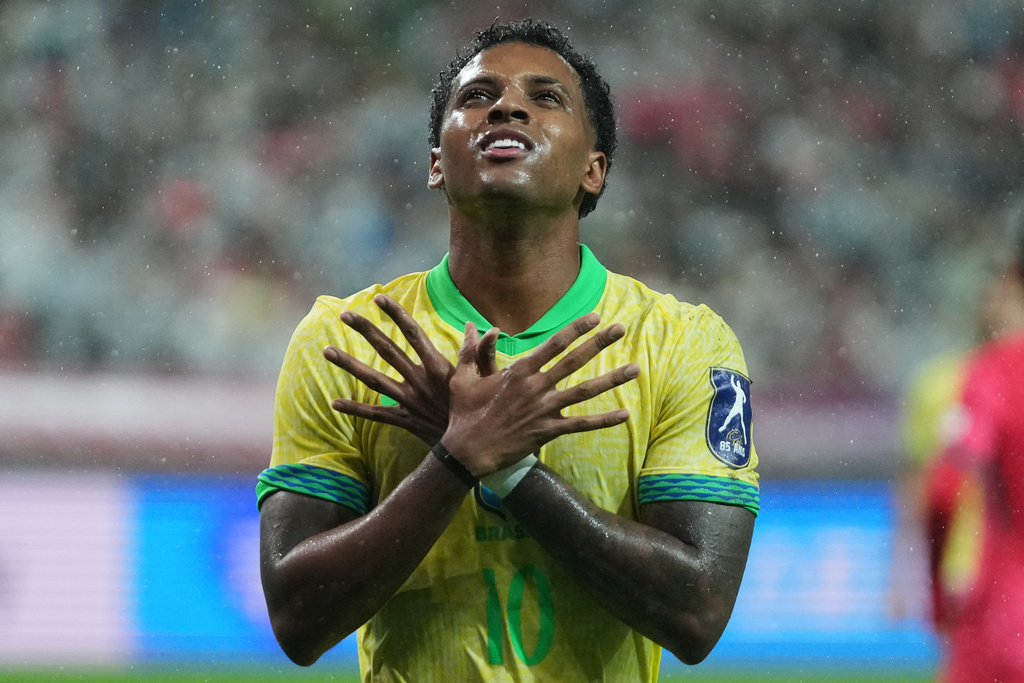 Brazil's Rodrygo celebrates after scoring his side's second goal during the international friendly soccer match between South Korea and Brazil at Seoul World Cup Stadium in Seoul, South Korea, Friday, Oct. 10, 2025. (AP Photo/Lee Jin-man)