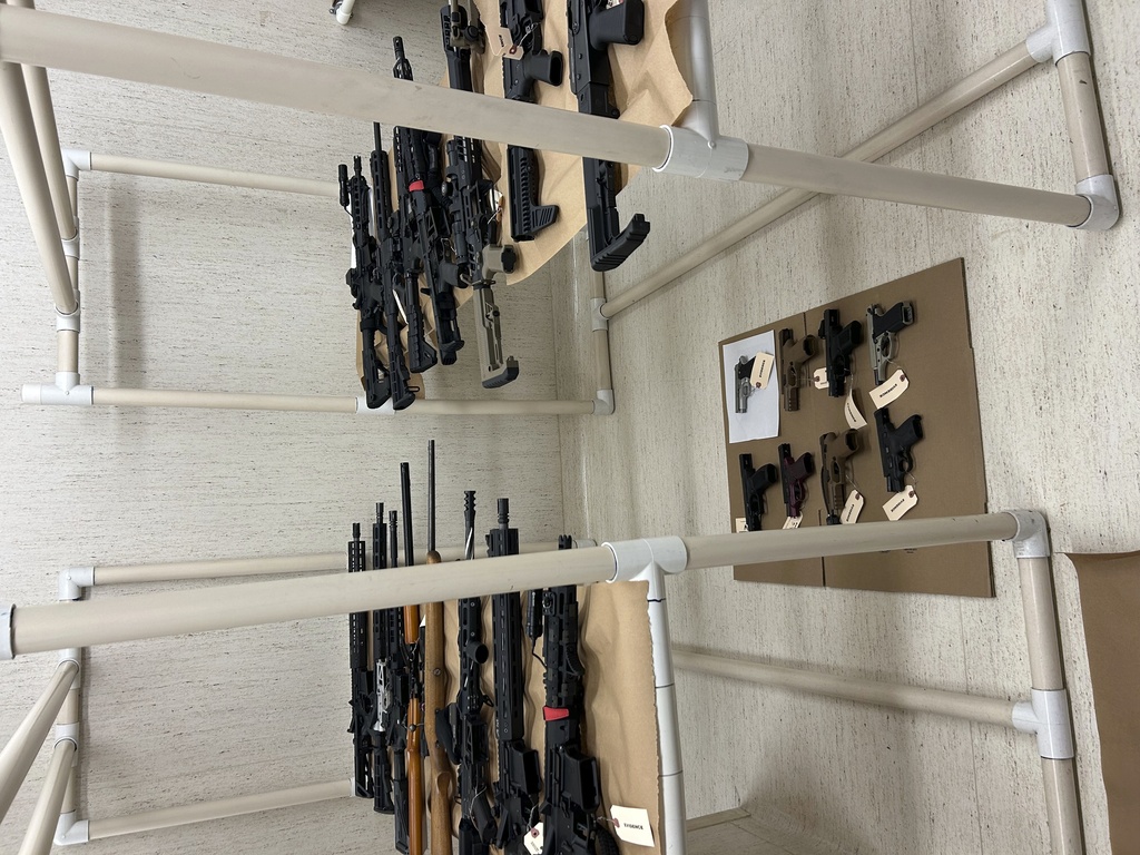 This image provided by Pierce County Sheriff's Office on Tuesday, Sept. 9, 2025 shows containers with weapons seized from the home of a 13-year-old boy in Pierce County, Wa., who authorities said had appeared to idolize school shooters. (Pierce County Sheriff's Office via AP)