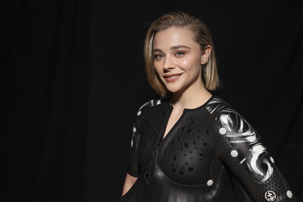 FILE - Chloe Grace Moretz attends the Louis Vuitton Spring/Summer 2024 womenswear fashion collection presented Monday, Oct. 2, 2023 in Paris. (AP Photo/Vianney Le Caer)