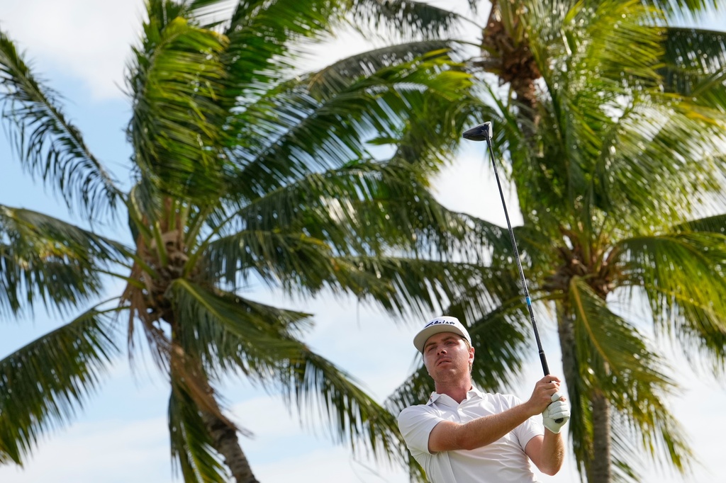 Ryan Gerard hits on the 14th hole during the third round of the Sony Open golf event at the Waialae Country Club in Honolulu, Saturday, Jan. 17, 2026. (AP Photo/Matt York)
