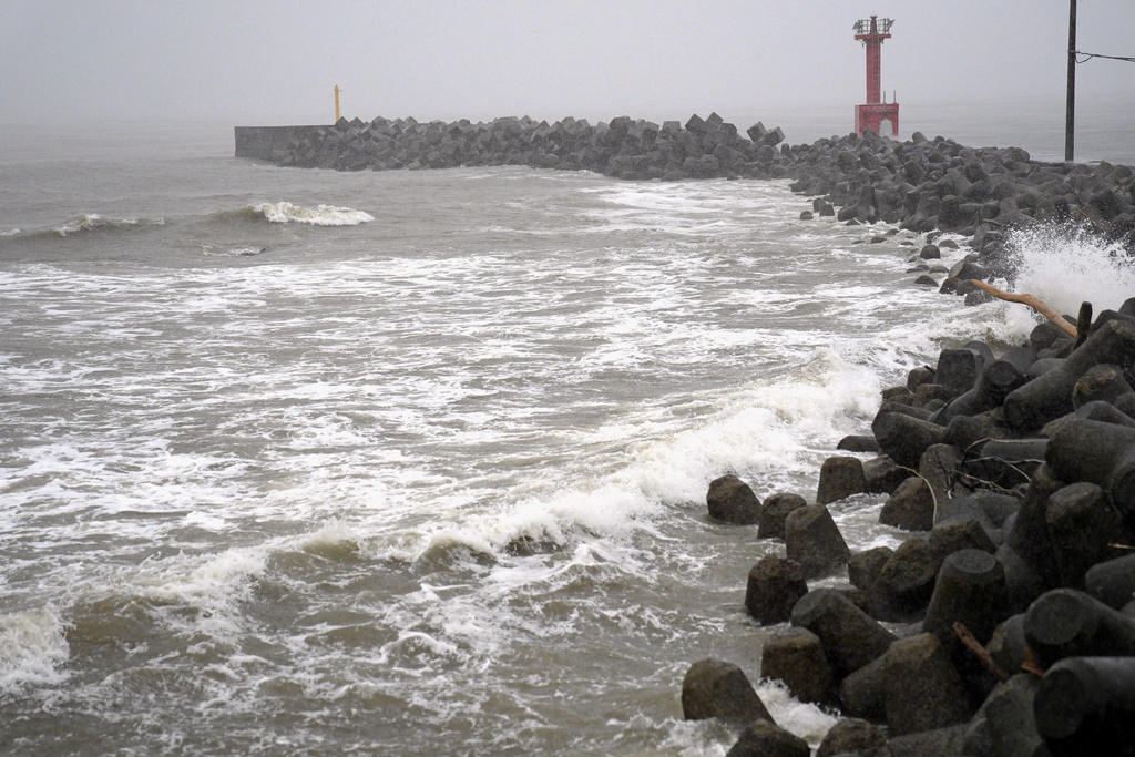 A coastline is hit by high waves as a typhoon approaches Futtsu city, Chiba prefecture near Tokyo, Saturday, June 27, 2026. (Kyodo News via AP)