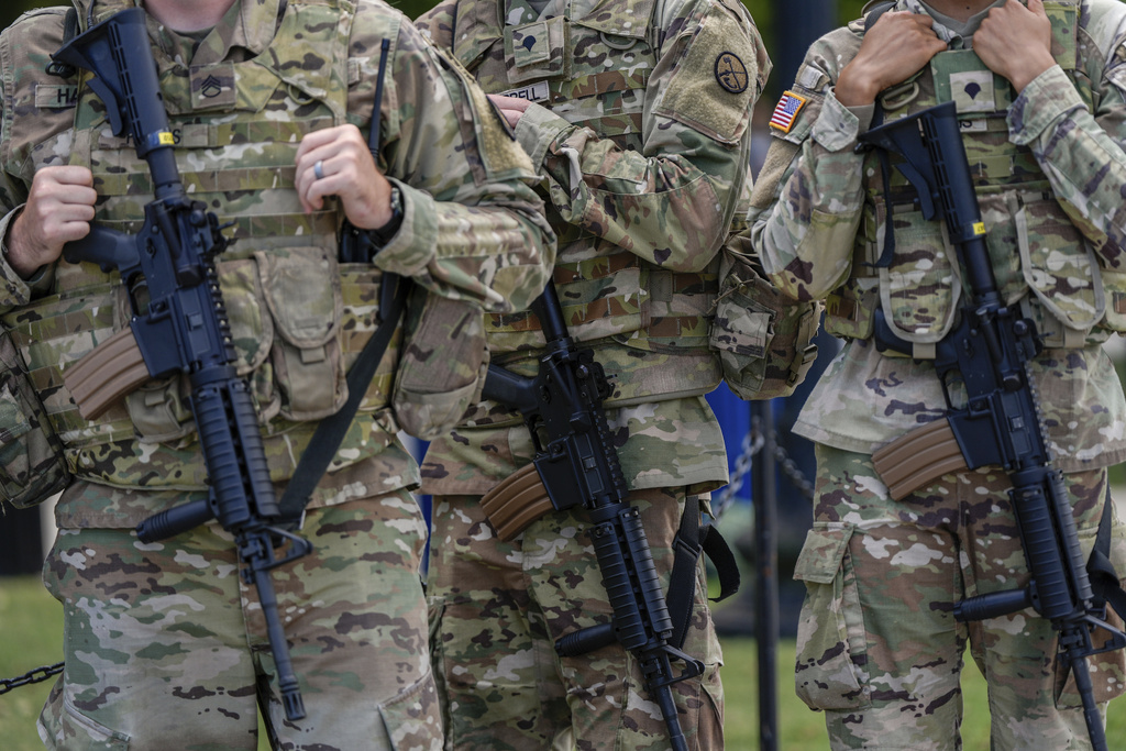 Armed West Virginia National Guardsmen patrol in front of the Lincoln Memorial, Tuesday, Aug. 26, 2025, in Washington. (AP Photo/Julia Demaree Nikhinson)