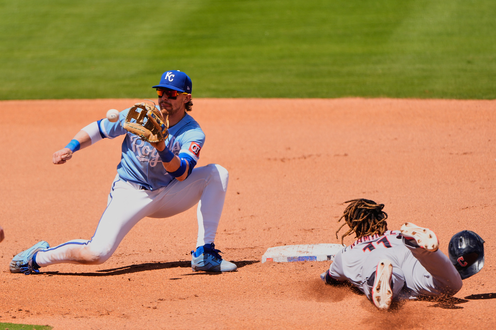 Cleveland Guardians' Jose Ramirez (11) is caught stealing second by Kansas City Royals shortstop Bobby Witt Jr. during the fourth inning of a baseball game Thursday, May 7, 2026, in Kansas City, Mo. (AP Photo/Charlie Riedel)