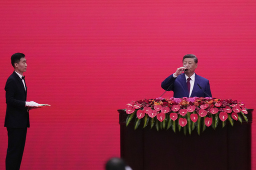 Chinese President Xi Jinping takes a drink at a reception following a military parade to commemorate the 80th anniversary of Japan's World War II surrender held in front of Tiananmen Gate in Beijing, Wednesday, Sept. 3, 2025. (AP Photo/Mahesh Kumar) Chinese President Xi Jinping takes a drink at a reception following a military parade to commemorate the 80th anniversary of Japan's World War II surrender held in front of Tiananmen Gate in Beijing, Wednesday, Sept. 3, 2025. (AP Photo/Mahesh Kumar)