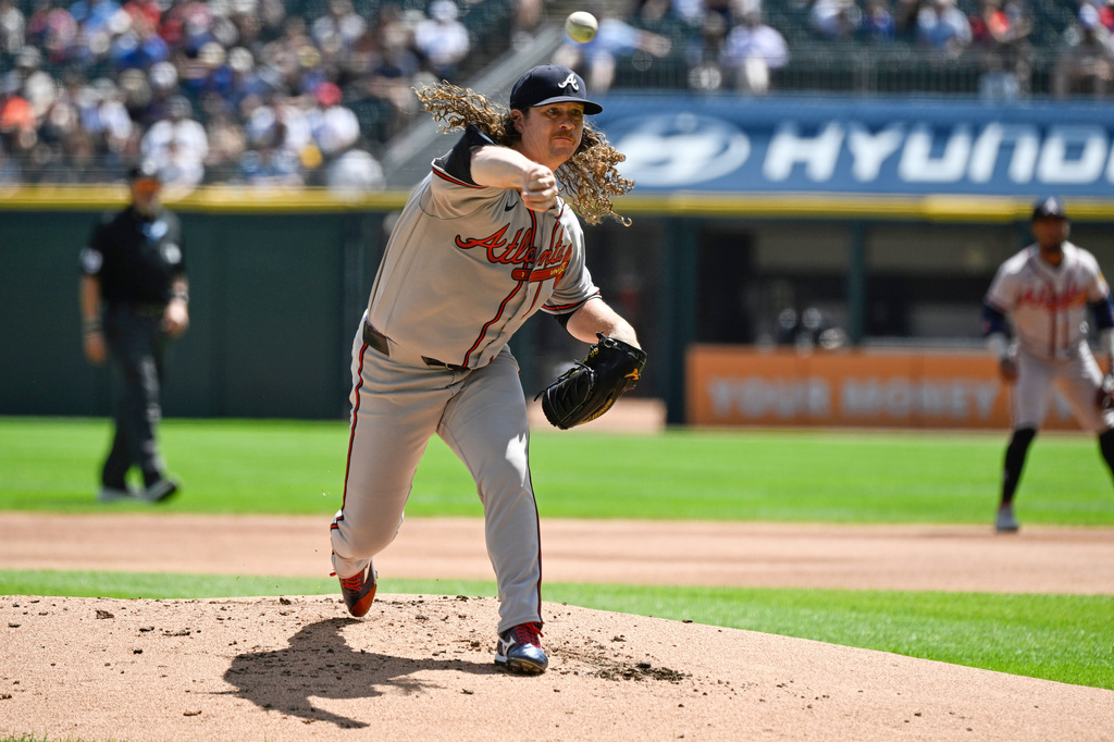 Atlanta Braves pitcher Grant Holmes delivers during the first inning of a baseball game against the Chicago White Sox, Thursday, Aug. 20, 2026, in Chicago. (AP Photo/Matt Marton)