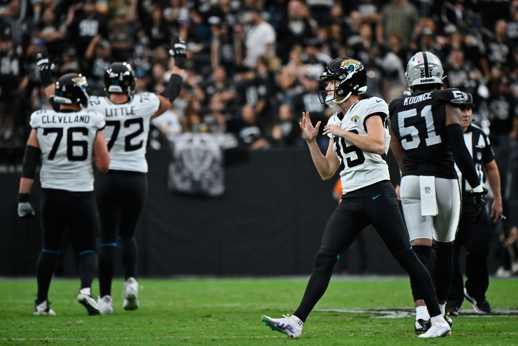 Jacksonville Jaguars place kicker Cam Little (39) reacts after making a 68-yard field goal during the first half of an NFL football game against the Las Vegas Raiders, Sunday, Nov. 2, 2025, in Las Vegas. (AP Photo/David Becker)