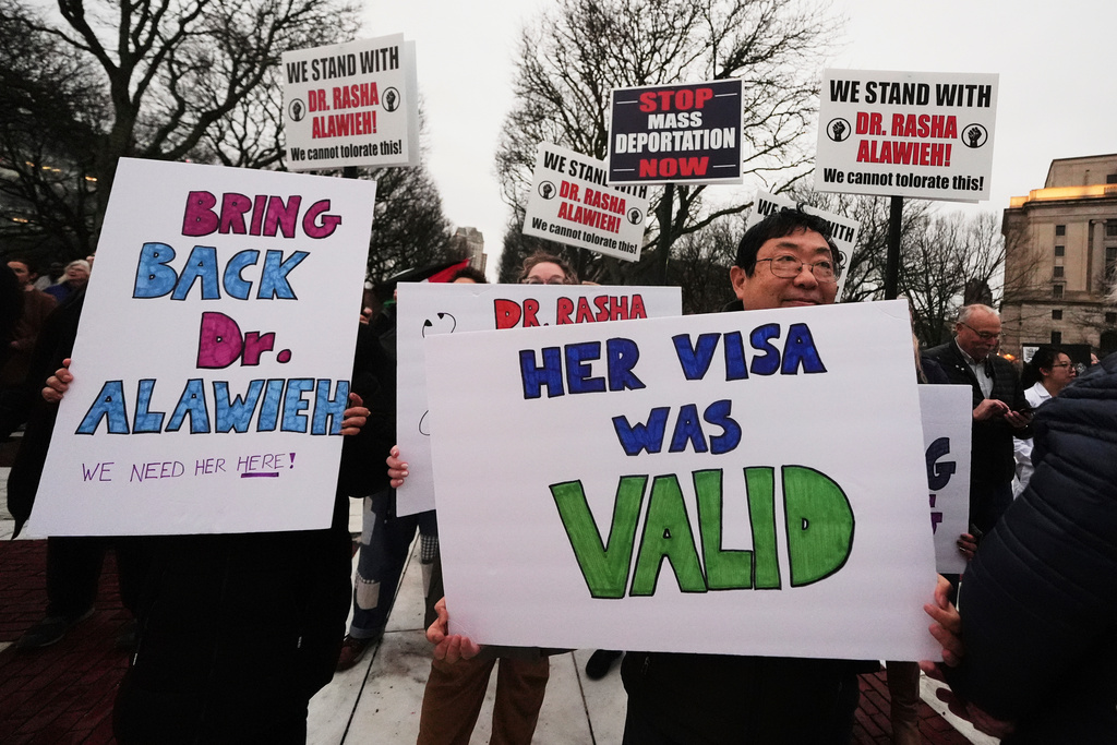 FILE - Protesters rally outside the Rhode Island State House in support of deported Brown University Dr. Rasha Alawieh, March 17, 2025, in Providence, R.I. (AP Photo/Charles Krupa, File)
