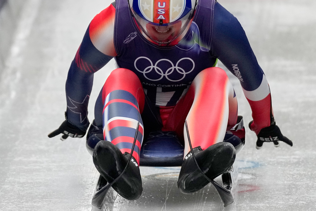 United States' Emily Fischnaller starts for a women's single luge run at the 2026 Winter Olympics, in Cortina d'Ampezzo, Italy, Monday, Feb. 9, 2026. (AP Photo/Aijaz Rahi)