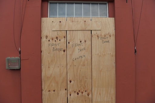 Wood covers up a door ahead of Hurricane Imelda's expected arrival in Hamilton, Bermuda, Wednesday, Oct. 1, 2025. (AP Photo/Anthony Wade) Wood covers up a door ahead of Hurricane Imelda's expected arrival in Hamilton, Bermuda, Wednesday, Oct. 1, 2025. (AP Photo/Anthony Wade)