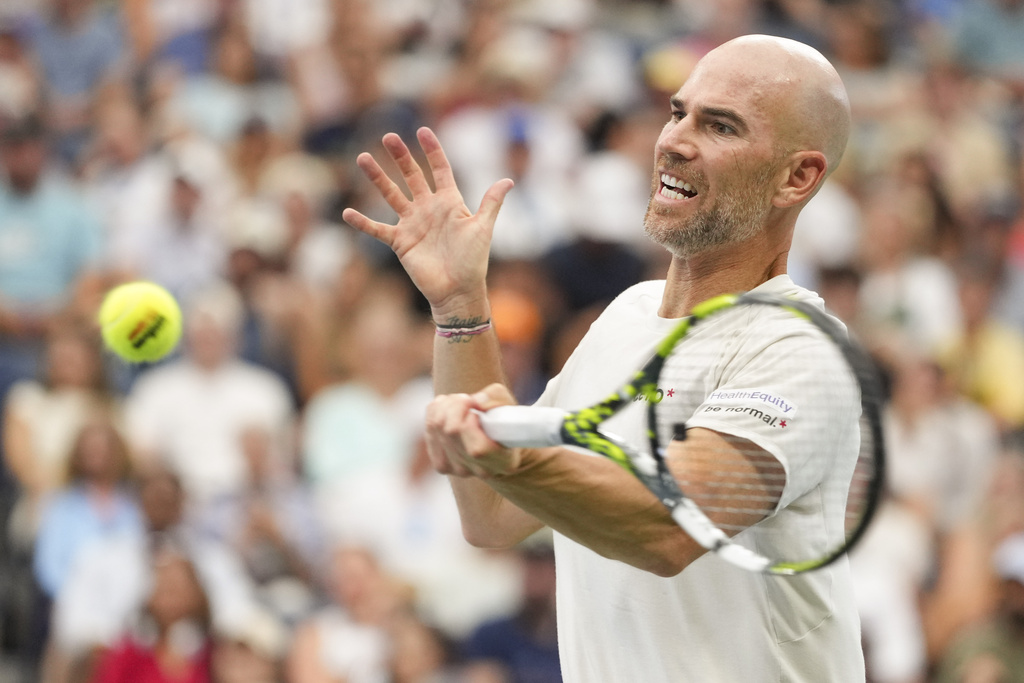 Adrian Mannarino, of France, returns a shot to Ben Shelton, of the United States, during the third round of the U.S. Open tennis championships, Friday, Aug. 29, 2025, in New York. (AP Photo/Kirsty Wigglesworth)