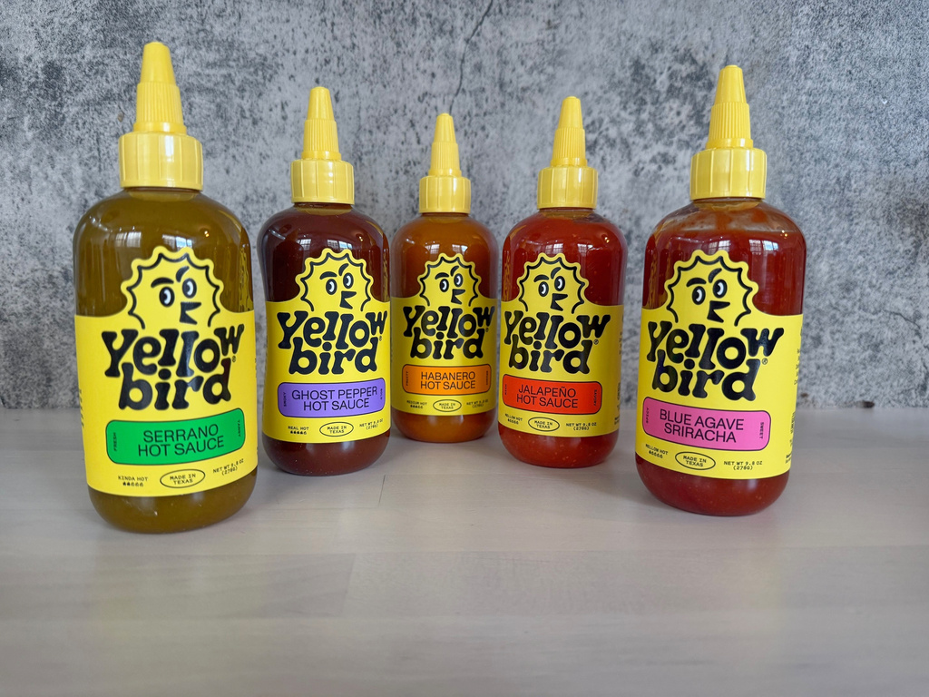 An assortment of Yellow Bird hot sauces are displayed in New York. (Katie Workman via AP)