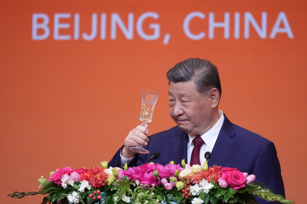 FILE - Chinese President Xi Jinping proposes a toast during a state dinner with President Donald Trump at the Great Hall of the People on May 14, 2026, in Beijing. (AP Photo/Mark Schiefelbein, file)
