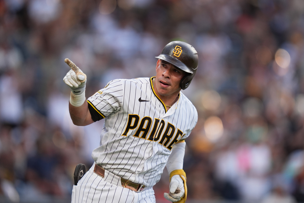 San Diego Padres' Freddy Fermin celebrates after hitting a two-run home run during the fourth inning of a baseball game against the San Francisco Giants Saturday, Aug. 1, 2026, in San Diego. (AP Photo/Gregory Bull)