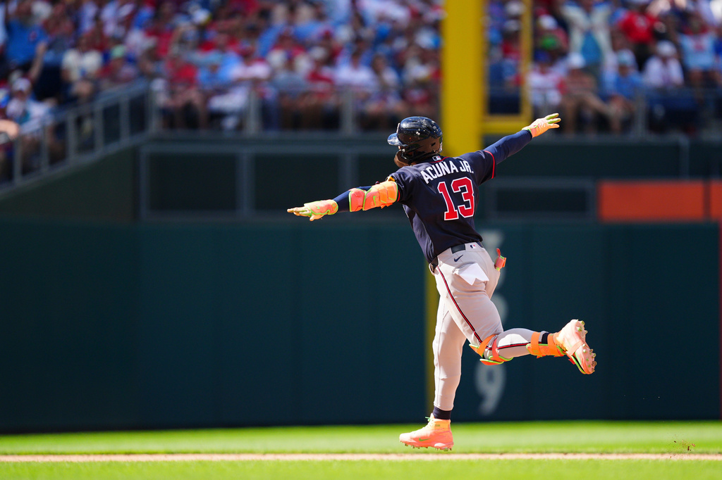Atlanta Braves' Ronald Acu&ntilde;a Jr. reacts after hitting a three-run home run off Philadelphia Phillies pitcher Alex McFarlane during the eighth inning of a baseball game, Sunday, Sept. 6, 2026, in Philadelphia. (AP Photo/Derik Hamilton)