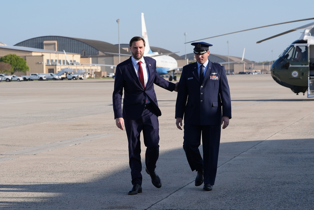 Vice President JD Vance walks to board Air Force Two, Friday, April 10, 2026, at Joint Base Andrews, Md., for expected departure to Pakistan, for talks on Iran. (AP Photo/Jacquelyn Martin, pool)