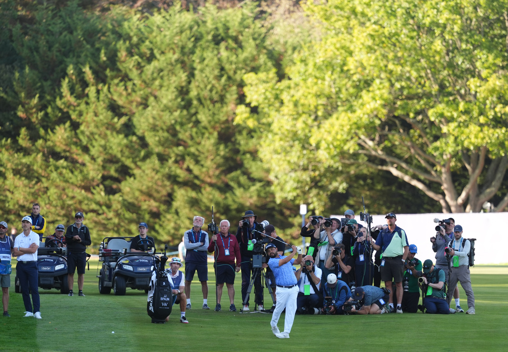 J. J. Spaun of United States plays onto the 18th green on day four of the PGA Championship at Wentworth Golf Club in Virginia Water, England, Sunday Sept. 20, 2026. (Adam Davy/PA via AP)