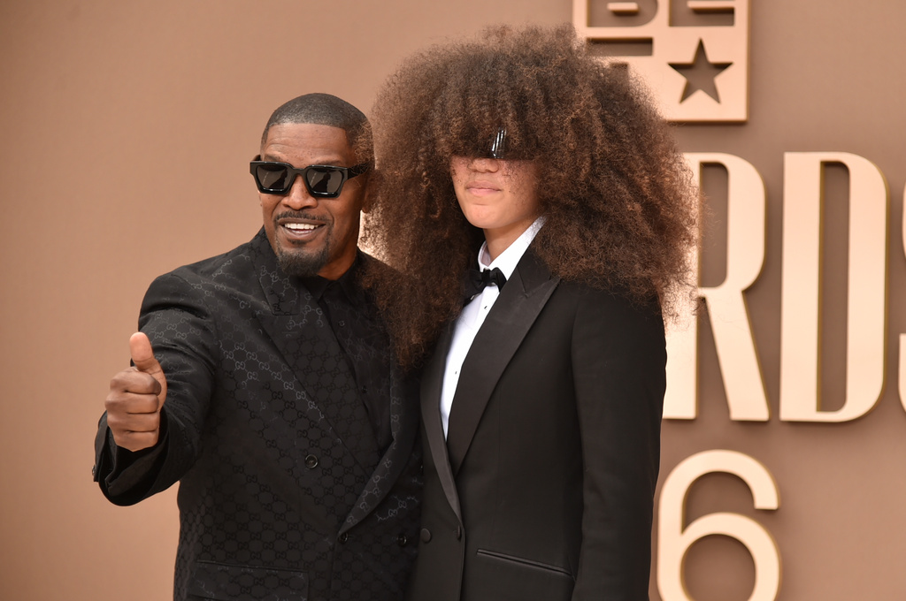 Jamie Foxx, left, and Anelise Bishop arrive at the BET Awards on Sunday, June 28, 2026, at the Peacock Theater in Los Angeles. (Photo by Richard Shotwell/Invision/AP)