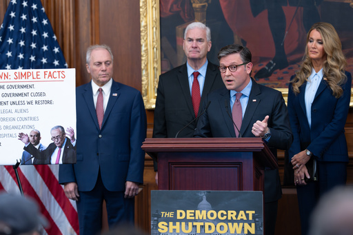 Speaker of the House Mike Johnson, R-La., faces reporters, joined from left by Majority Leader Steve Scalise, R-La., Majority Whip Tom Emmer, R-Minn., and Small Business Administration head Kelly Loeffler at a news conference on day 27 of the government shutdown, at the Capitol in Washington, Monday, Oct. 27, 2025. (AP Photo/J. Scott Applewhite) Speaker of the House Mike Johnson, R-La., faces reporters, joined from left by Majority Leader Steve Scalise, R-La., Majority Whip Tom Emmer, R-Minn., and Small Business Administration head Kelly Loeffler at a news conference on day 27 of the government shutdown, at the Capitol in Washington, Monday, Oct. 27, 2025. (AP Photo/J. Scott Applewhite)