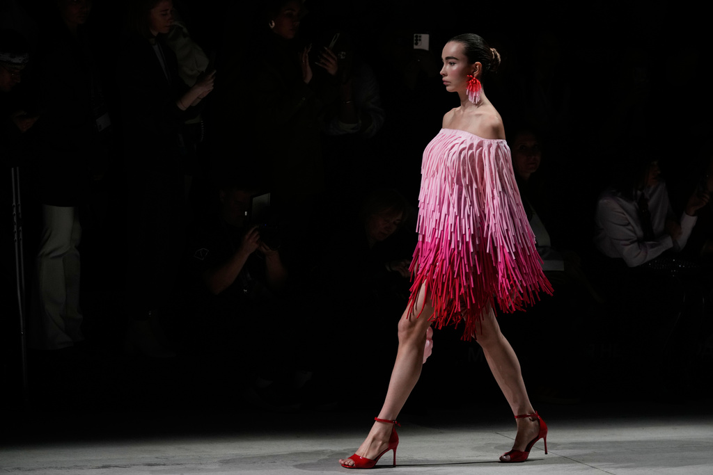 A model wears a creation by Russian brand Big Brooch on a runway at the Moscow Fashion Week in Moscow, Saturday, March 14, 2026. (AP Photo/Pavel Bednyakov)
