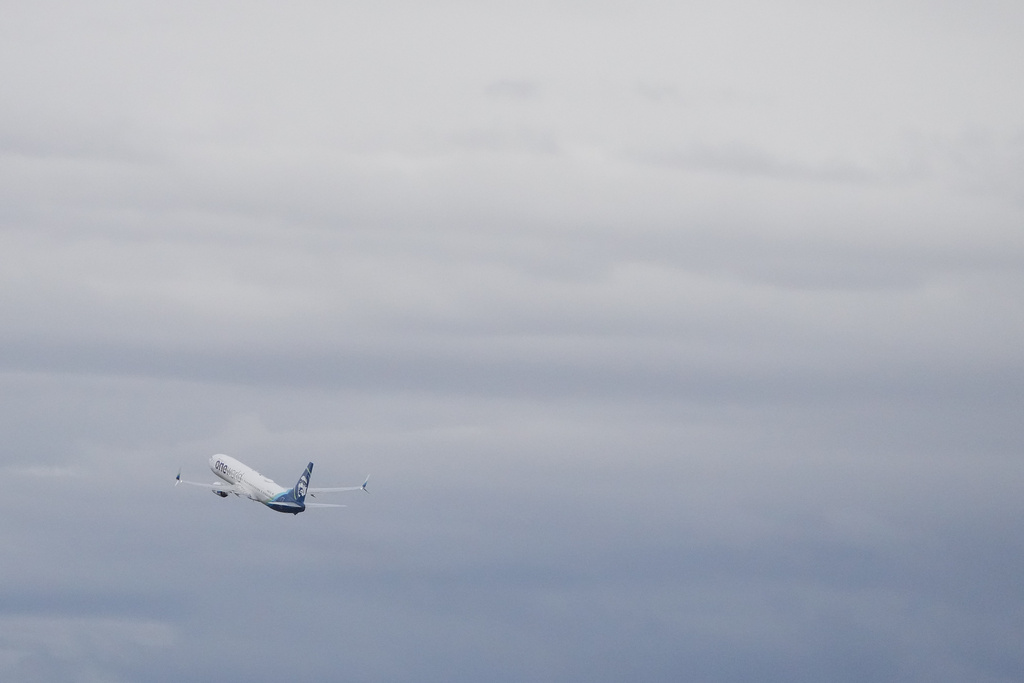 FILE - An Alaska Airlines airplane takes off at Seattle-Tacoma International Airport, Nov. 6, 2025, in SeaTac, Wash. (AP Photo/Lindsey Wasson, File)