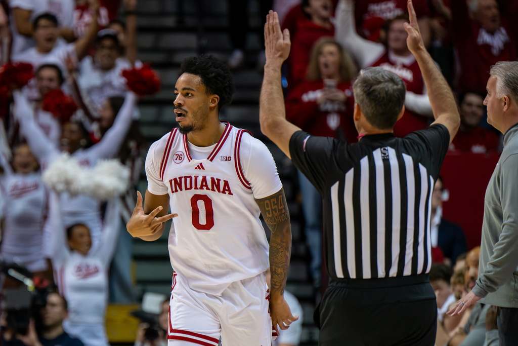 Indiana guard Jasai Miles (0) reacts after scoring during the first half of an NCAA college basketball game against Purdue, Tuesday, Jan. 27, 2026, in Bloomington, Ind. (AP Photo/Doug McSchooler)