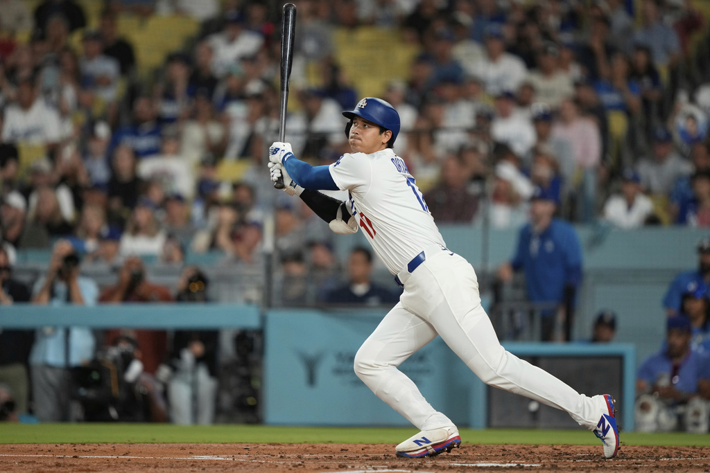Los Angeles Dodgers' Shohei Ohtani watches his fly out during the second inning of a baseball game against the Philadelphia Phillies Wednesday, Sept. 17, 2025, in Los Angeles. (AP Photo/Mark J. Terrill)