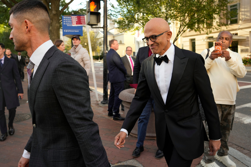 Microsoft CEO Satya Nadella walks to the White House to attend a state dinner hosted for China's President Xi Jinping, Thursday, Sept. 24, 2026, in Washington. (AP Photo/Carolyn Kaster)